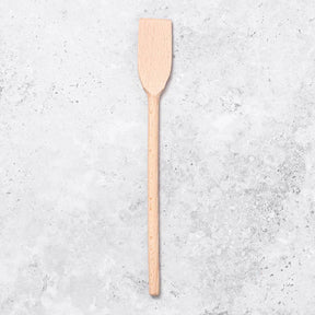 Small flat edged wooden spatula for frying